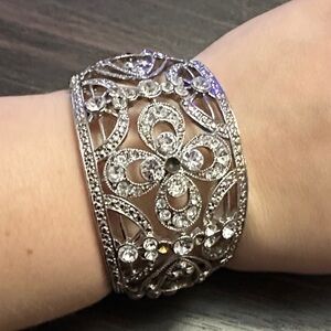 Intricate Silver Bracelet with Crystal Details